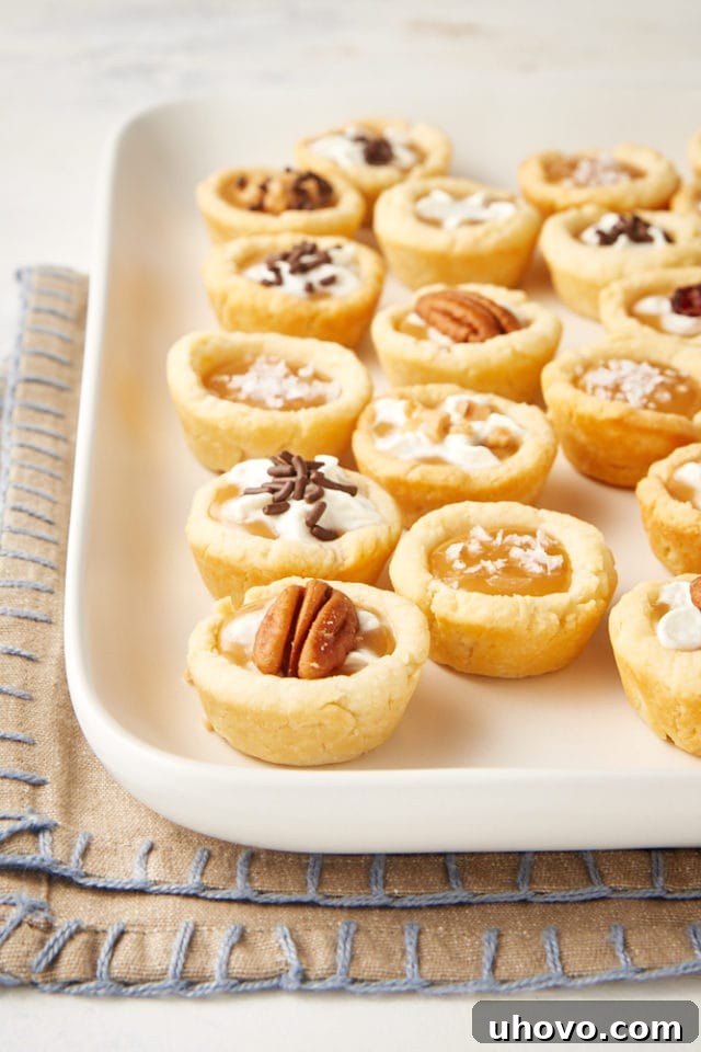 Mini Caramel Tarts on a white serving tray