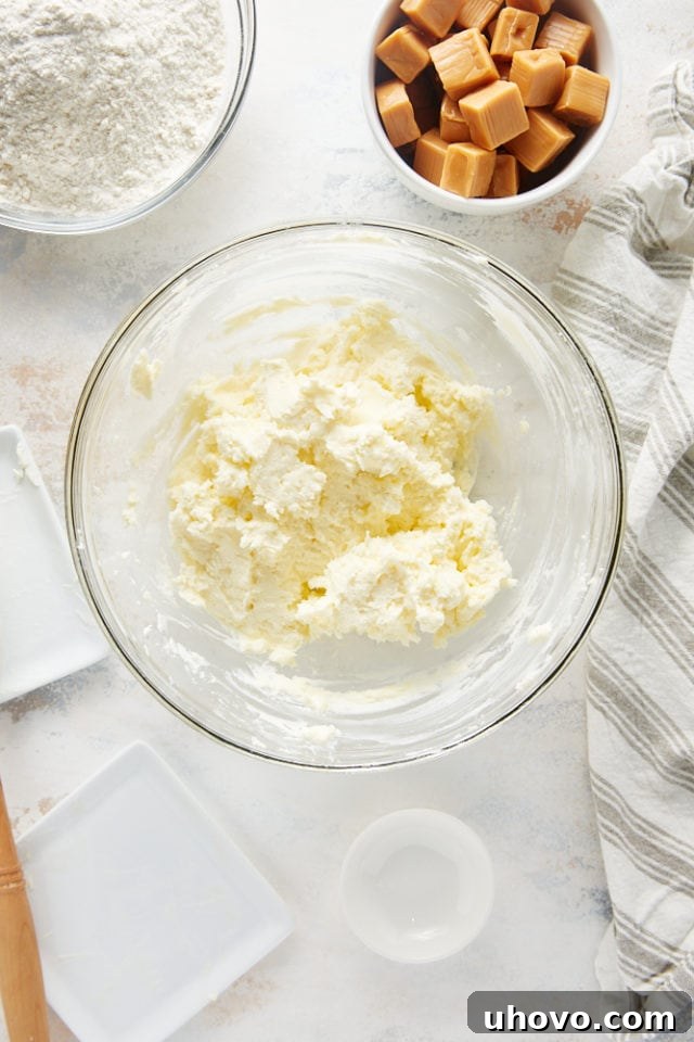 Dough for the crust being mixed in a bowl.