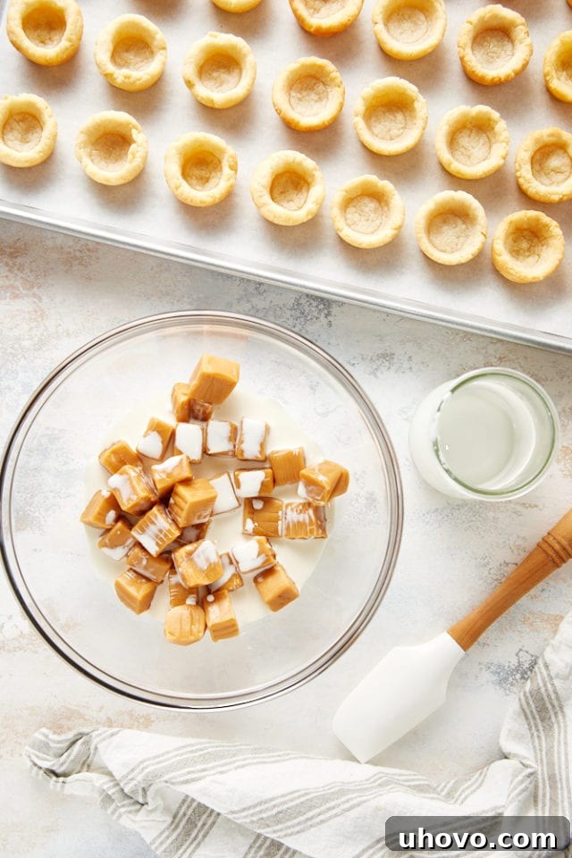 Caramel and heavy cream combined in a bowl for the filling