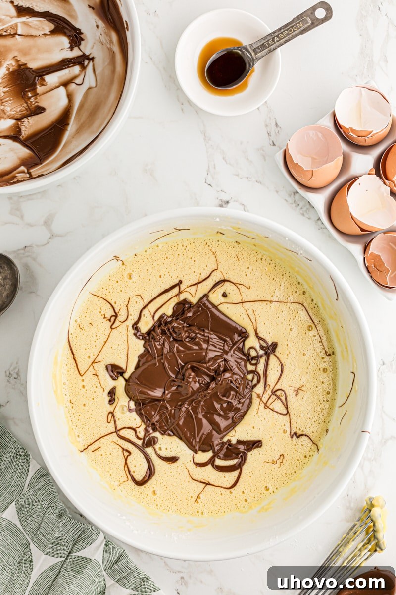 Melted chocolate added to mousse cupcake batter