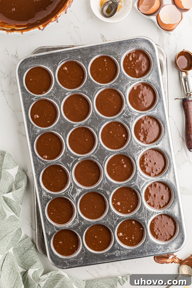 Chocolate mousse mini cupcake batter in pan