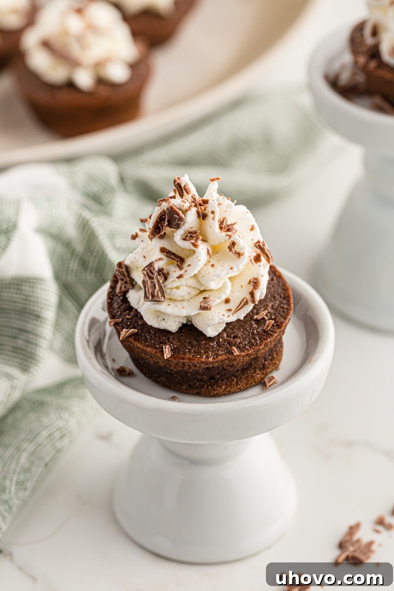 Chocolate mousse mini cupcake on small pedestal