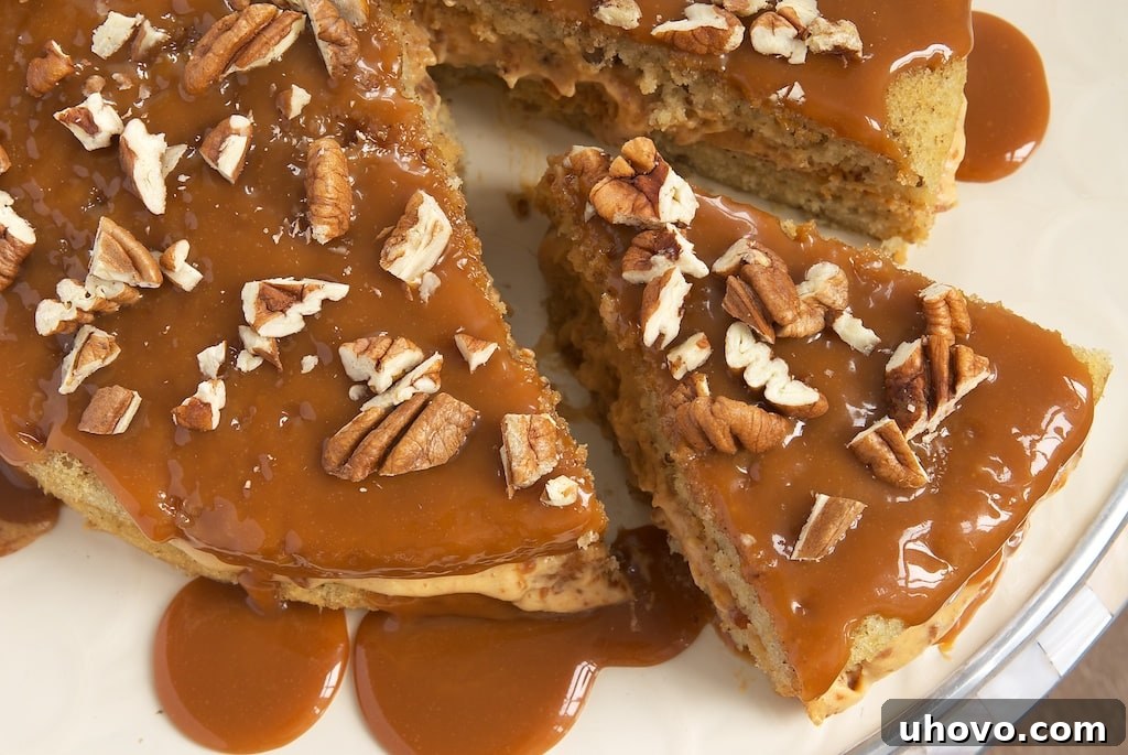 Pecan Cake with Caramel Mousse combines layers of nutty cake with a rich caramel mousse and caramel sauce. Delicious!