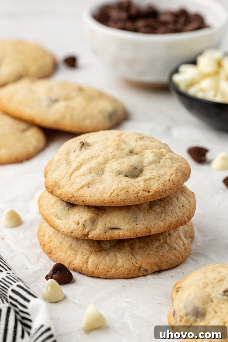 Stack of 3 black and white chocolate chip cookies