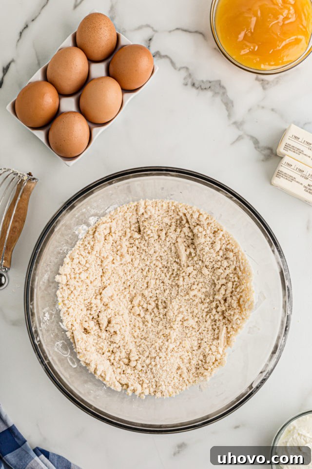 Overhead view of crumb topping in glass bowl