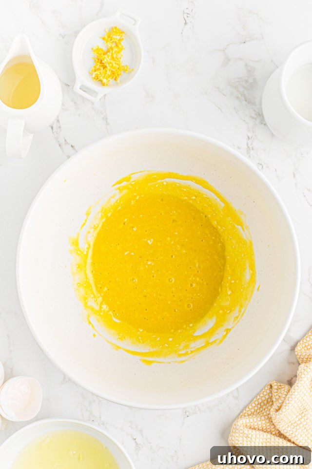Combined egg yolks and butter, thoroughly mixed until smooth and creamy.