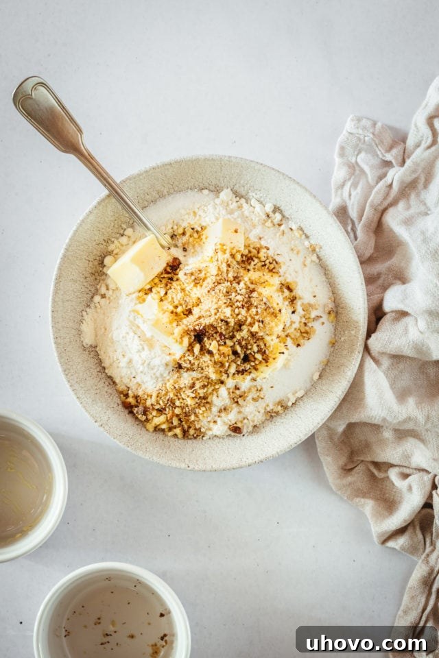 Overhead view of muffin topping ingredients in bowl before mixing