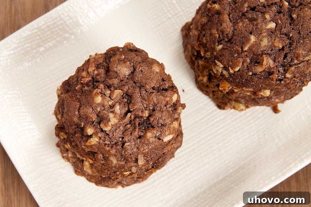 Triple Chocolate Coconut Cookies are big, thick cookies packed with lots of coconut, three kinds of chocolate, and nuts. Delicious!