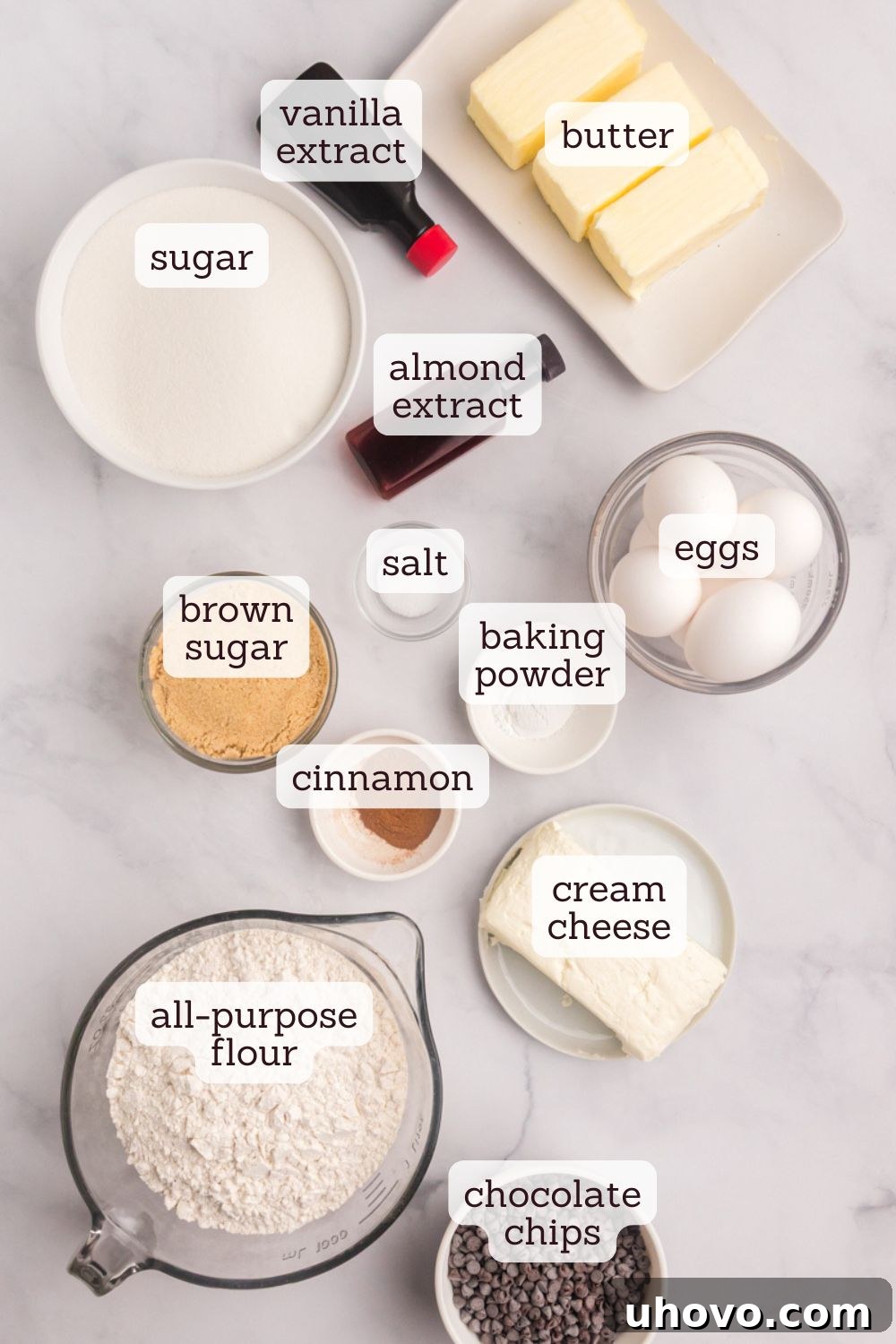 An overhead view showcasing all the key ingredients for the chocolate chip crumb pound cake, neatly arranged and ready for baking.