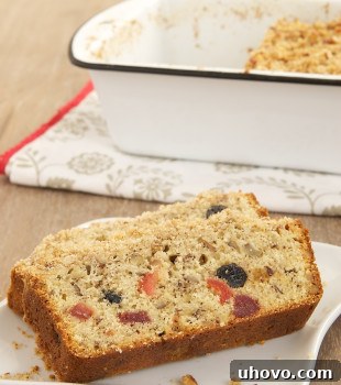 slices of Berry Pecan Streusel Bread on a white plate