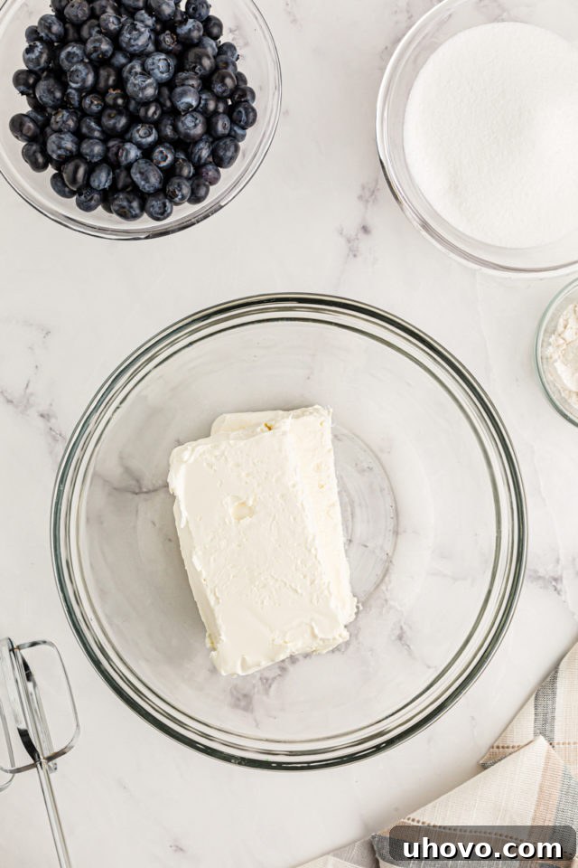 Overhead view of cream cheese bars in glass bowl