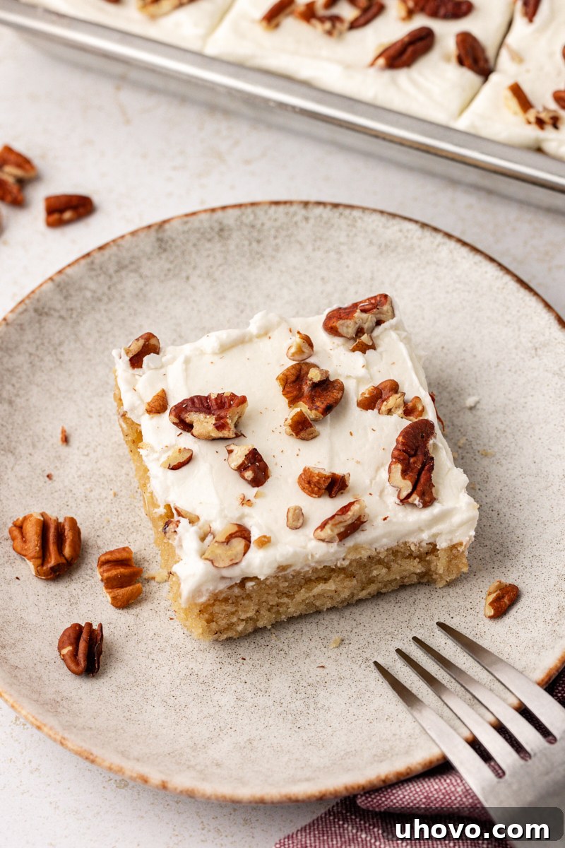 Square of brown butter Texas sheet cake on plate