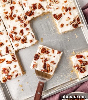 Sliced brown butter Texas sheet cake in pan