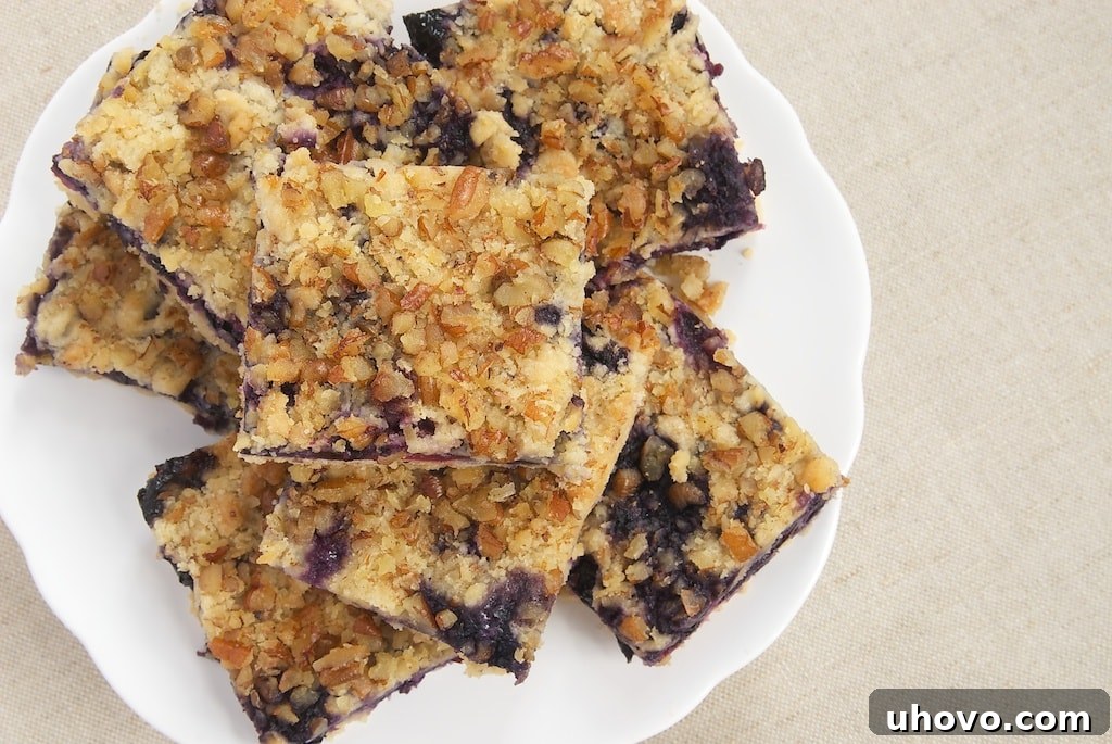 Use your favorite berries to make these simple Berry Crumb Bars. A perfectly lovely summer dessert!