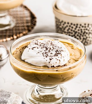Butterscotch pudding with whipped cream on top