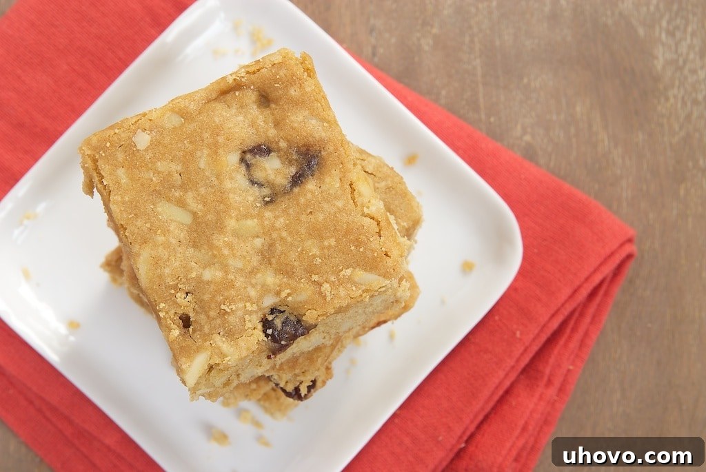 Cherry Almond Blondies combine tart cherries and crunchy almonds in a delicious blondie made with whole wheat flour and yogurt.