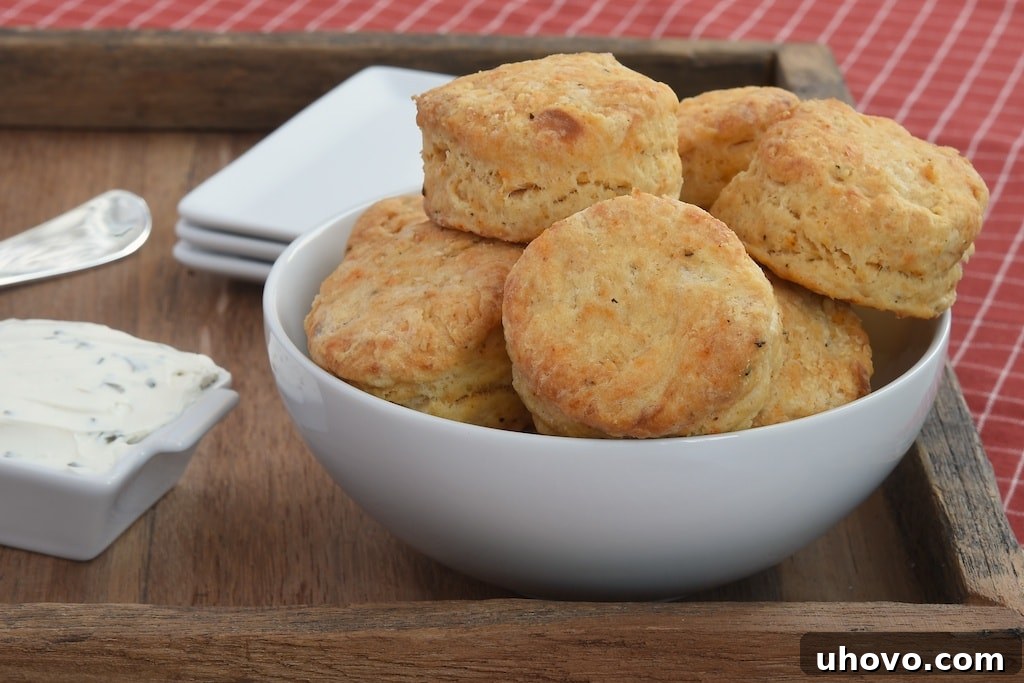 These Savory Cream Cheese Biscuits deliver a powerful flavor punch with their combination of hot sauce and carefully selected spices. They are an ideal accompaniment for your favorite soup or chili, enhancing any comforting meal.