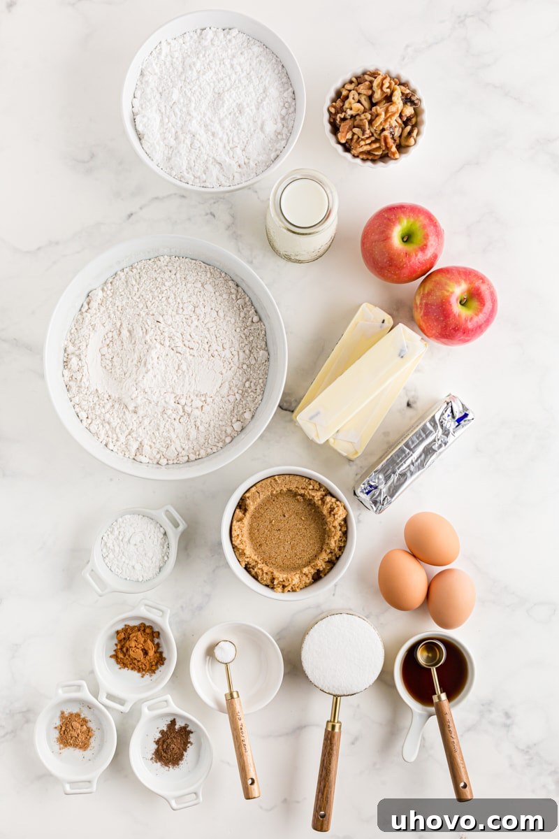 Overhead view of all the fresh ingredients laid out for baking Apple Spice Cake