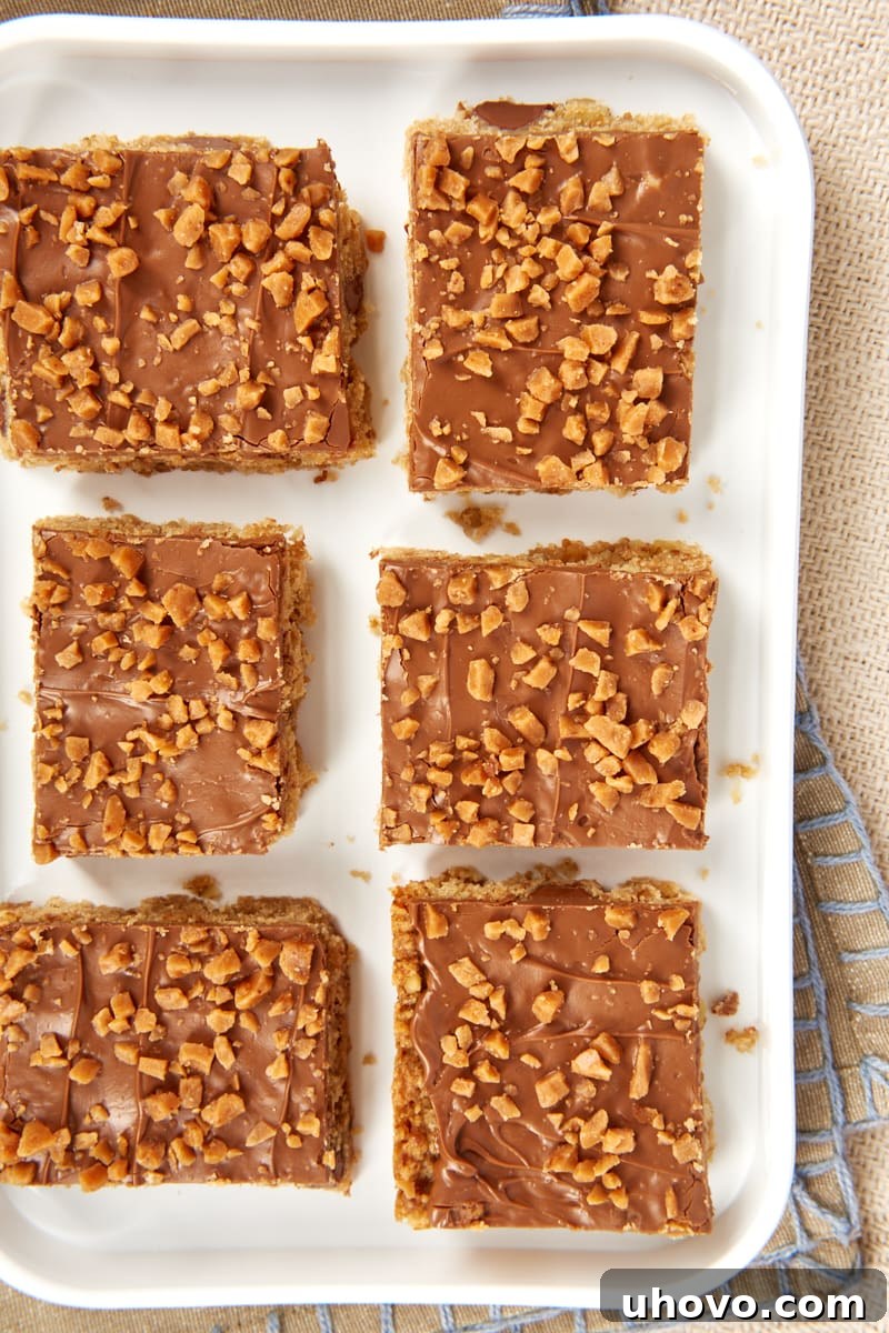 overhead view of Chocolate Toffee Bars on a white tray