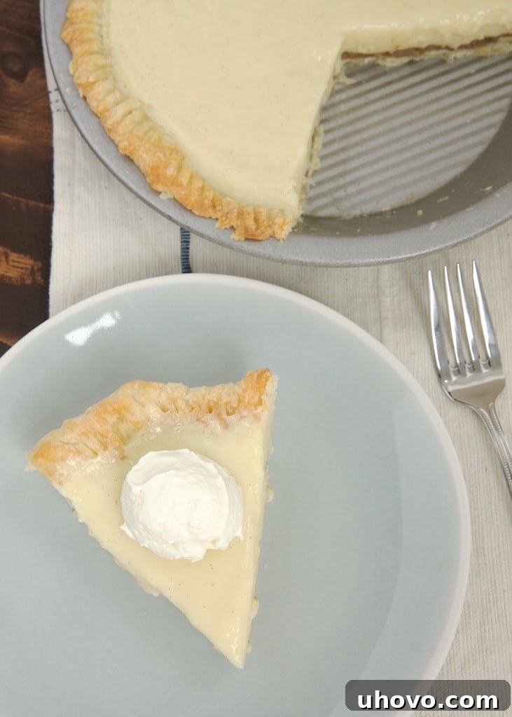 Praline Cream Pie is sweet, creamy, nutty, crunchy, and absolutely delicious! This vanilla pudding pie with a sweet pecan praline surprise is perfect for any occasion.