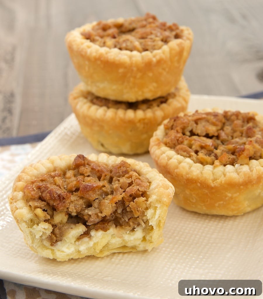 How do you improve on pecan pie? With coconut and cream cheese, of course! Coconut Pecan Tarts at Bake or Break