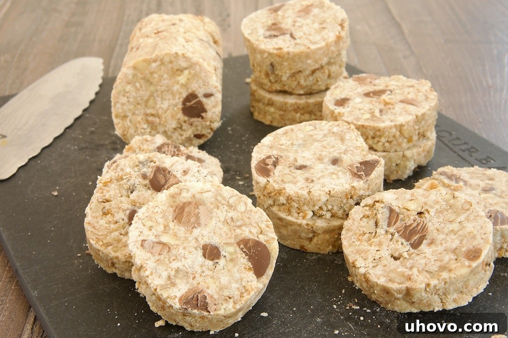 sliced Chocolate Chip Pecan No-Bake Cookies on a cutting board, ready for serving