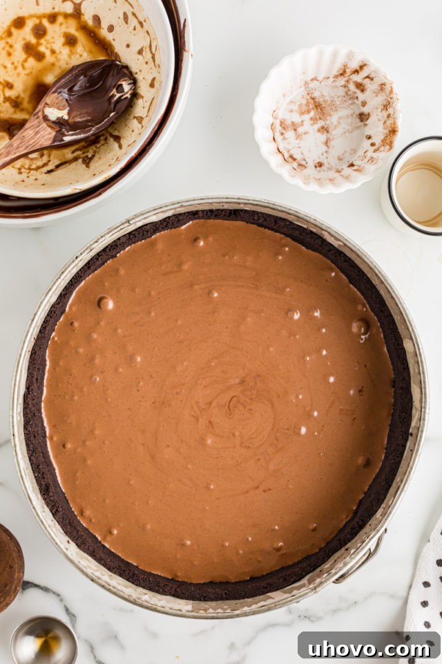 Overhead view of flourless cake batter in pan