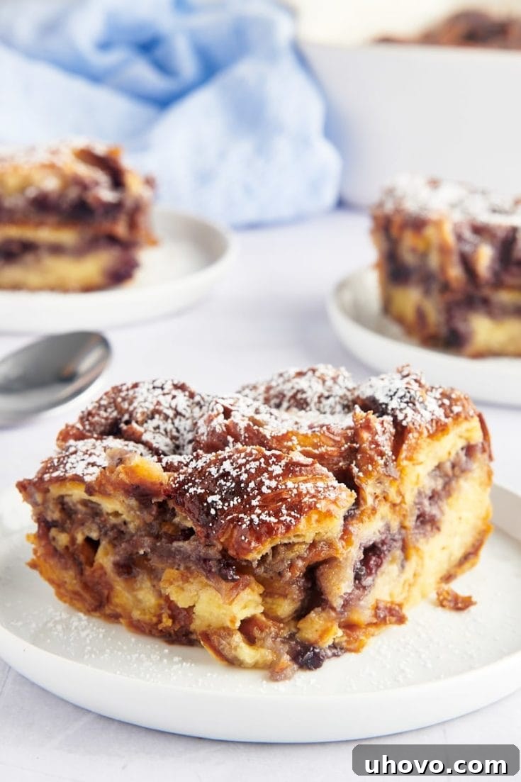 Warm Blueberry Croissant Bread Pudding with fresh blueberries.