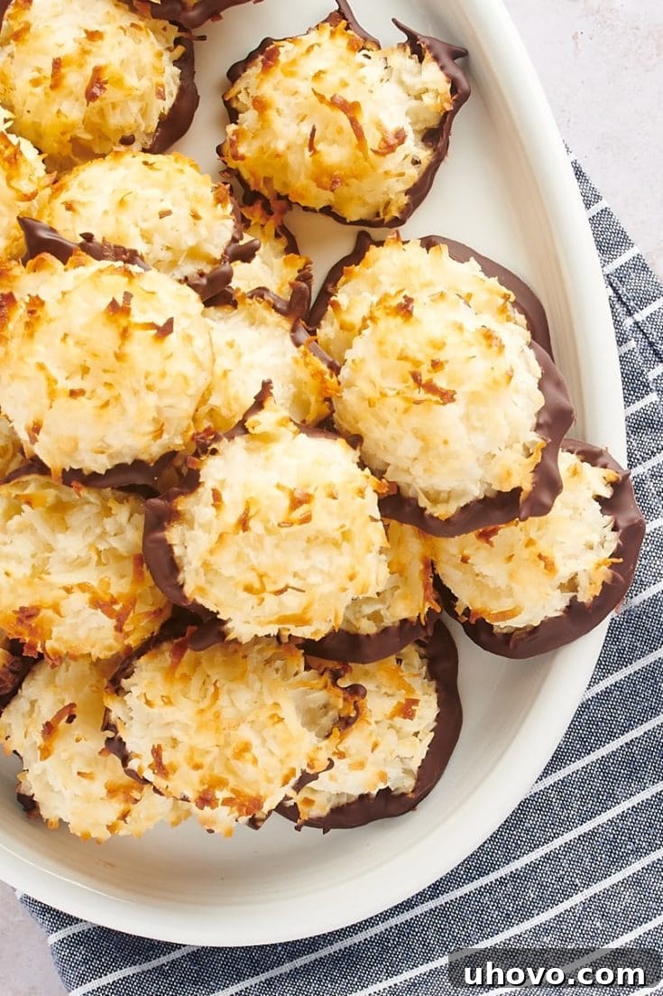 Soft and chewy Coconut Macaroons, some dipped in chocolate.