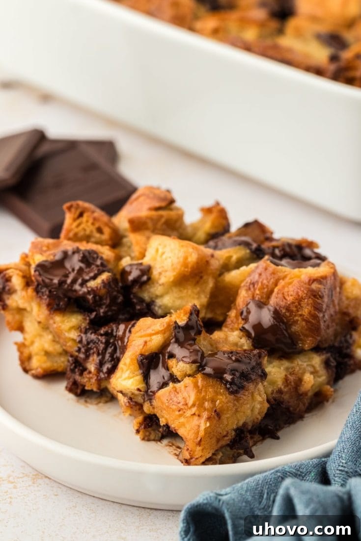 Chocolate Croissant Bread Pudding in a rustic dish.