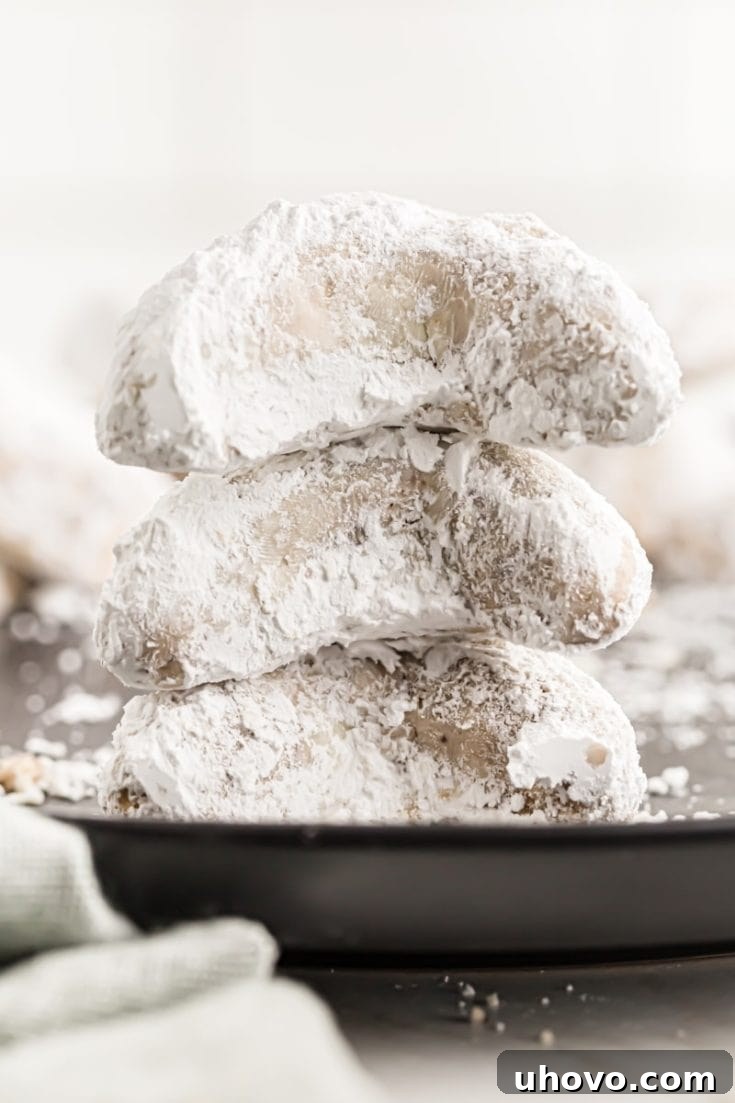 Hazelnut Crescent Cookies dusted with powdered sugar.