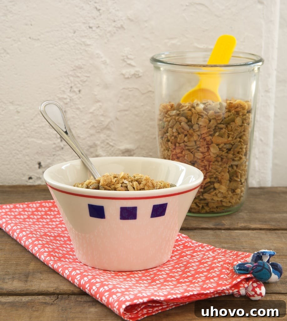 Oats, nuts, seeds, coconut, brown sugar, and maple syrup make this granola absolutely delicious! It's a perfect addition to a bowl of yogurt. - Bake or Break