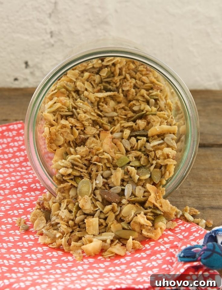My favorite granola is made with lots of oats, seeds, coconut, nuts, and maple syrup, perfect for a healthy breakfast or snack.