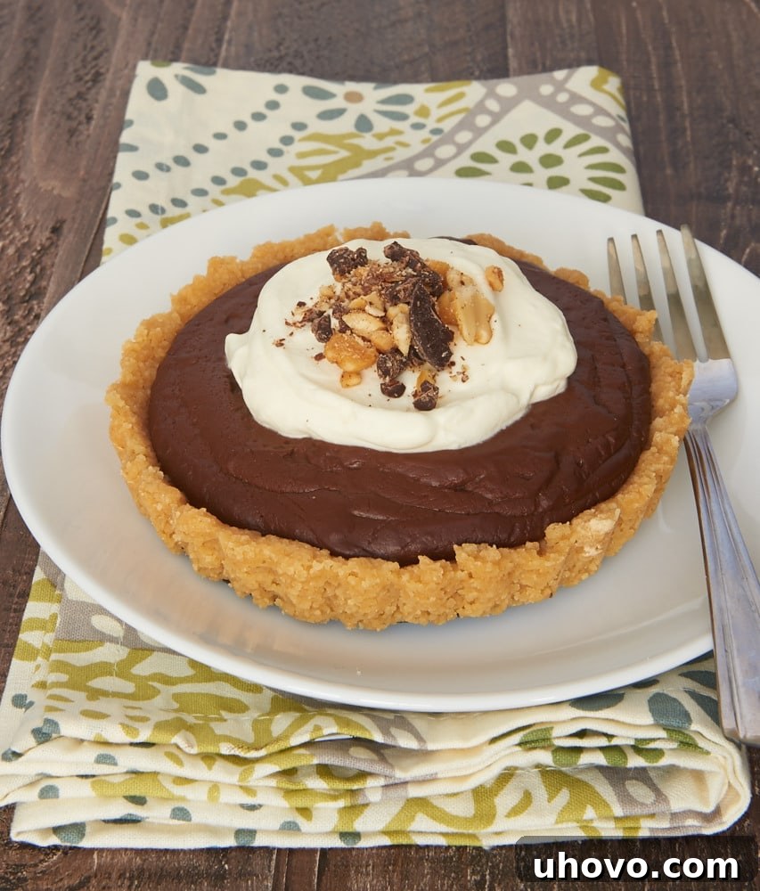 Rich chocolate peanut butter pudding and a sweet, crisp shortbread crust create absolutely irresistible individual tarts.