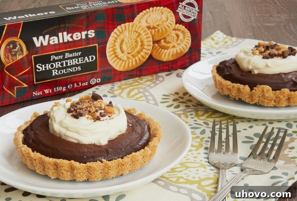 Elegant individual Chocolate Peanut Butter Pudding Tarts showcasing the beautiful shortbread crust and rich filling.