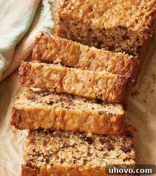 Sliced Chocolate Chip Oatmeal Quick Bread on parchment paper