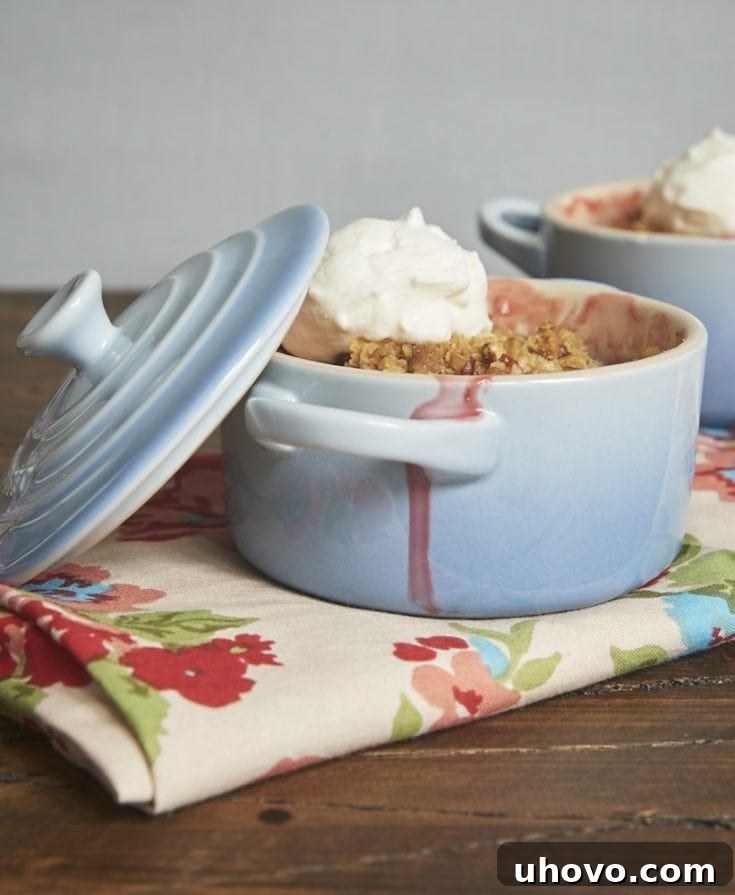 Strawberry Pecan Crumble topped with sweetened whipped cream