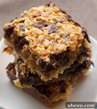 A close-up of a perfectly baked Chocolate Cashew Bar, showing the rich topping and golden crust.