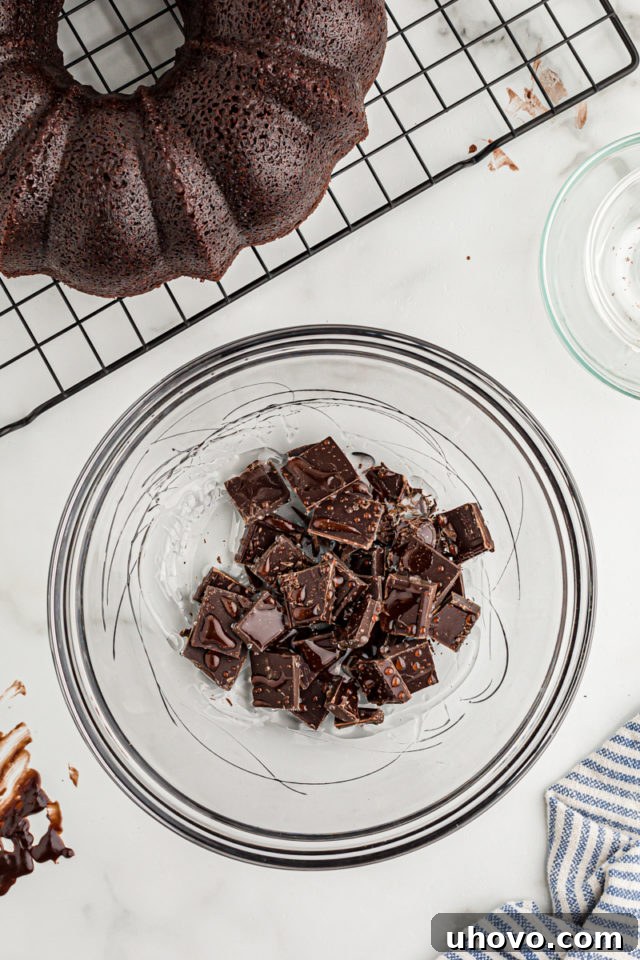 Overhead view of chocolate and corn syrup in glass bowl