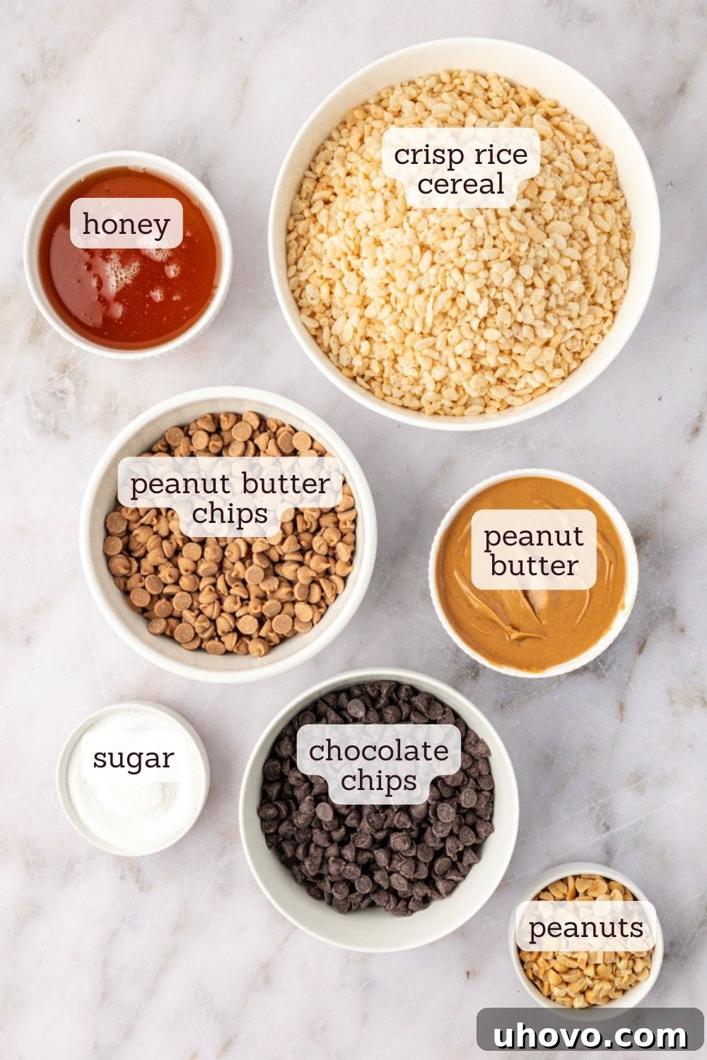 An overhead shot showcasing all the essential ingredients laid out for making delicious chocolate peanut butter rice crispy treats, ready for preparation.