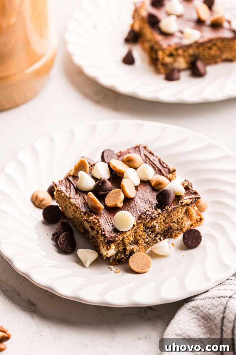 Peanut butter mud bars on white plates