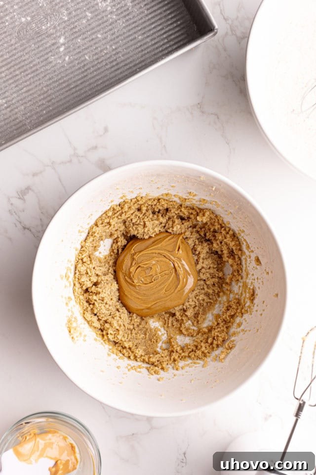 Peanut butter added to creamed butter and sugar