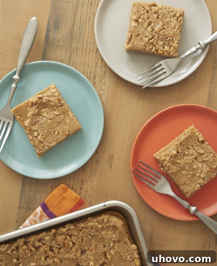 overhead view of slices of Praline Sheet Cake on colorful plates