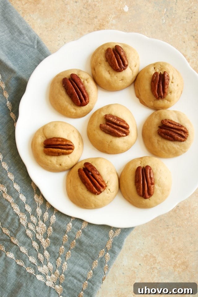 Overhead view of freshly baked Pound Cake Cookies arranged neatly on a pristine white tray