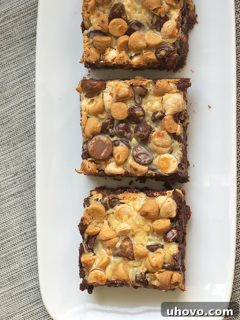 Overhead view of decadent n-Layer Brownies on a small white tray