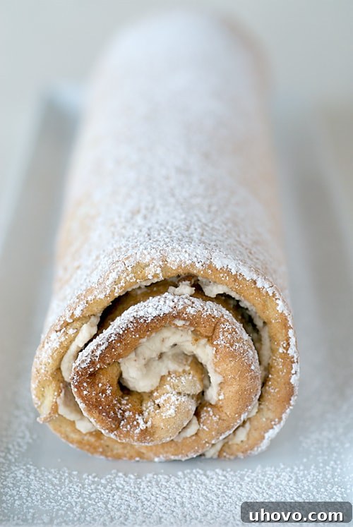 Toasted Pecan Roulade on a long white tray, ready to be served