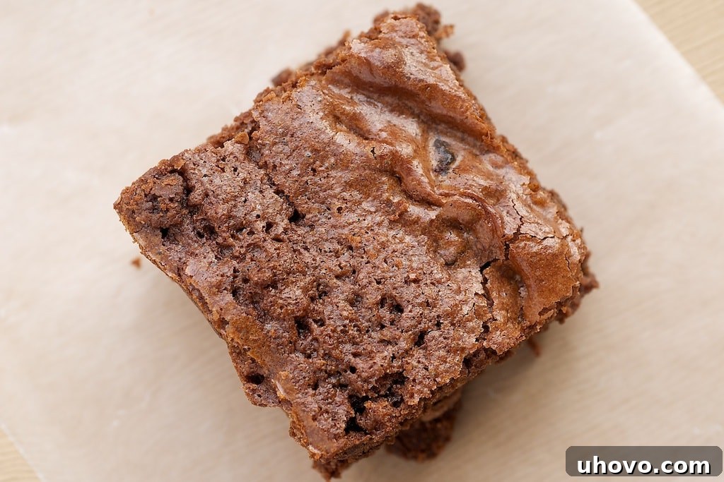 Kitchen Sink Brownies are packed with all kinds of good stuff. You never have to make this versatile recipe the same way twice! - Bake or Break