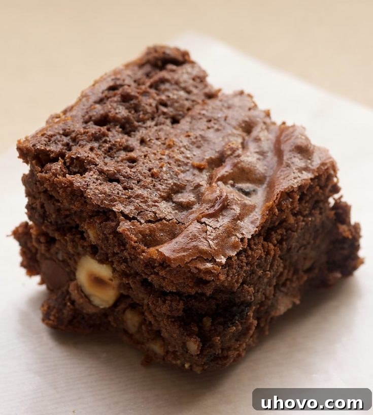 Kitchen sink brownie on parchment paper.