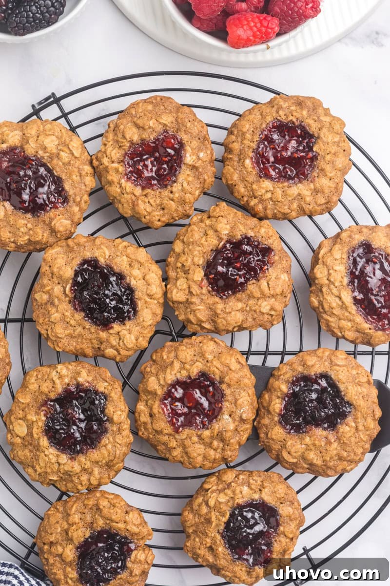 overhead view of oatmeal thumbprint cookies on a cooling rack