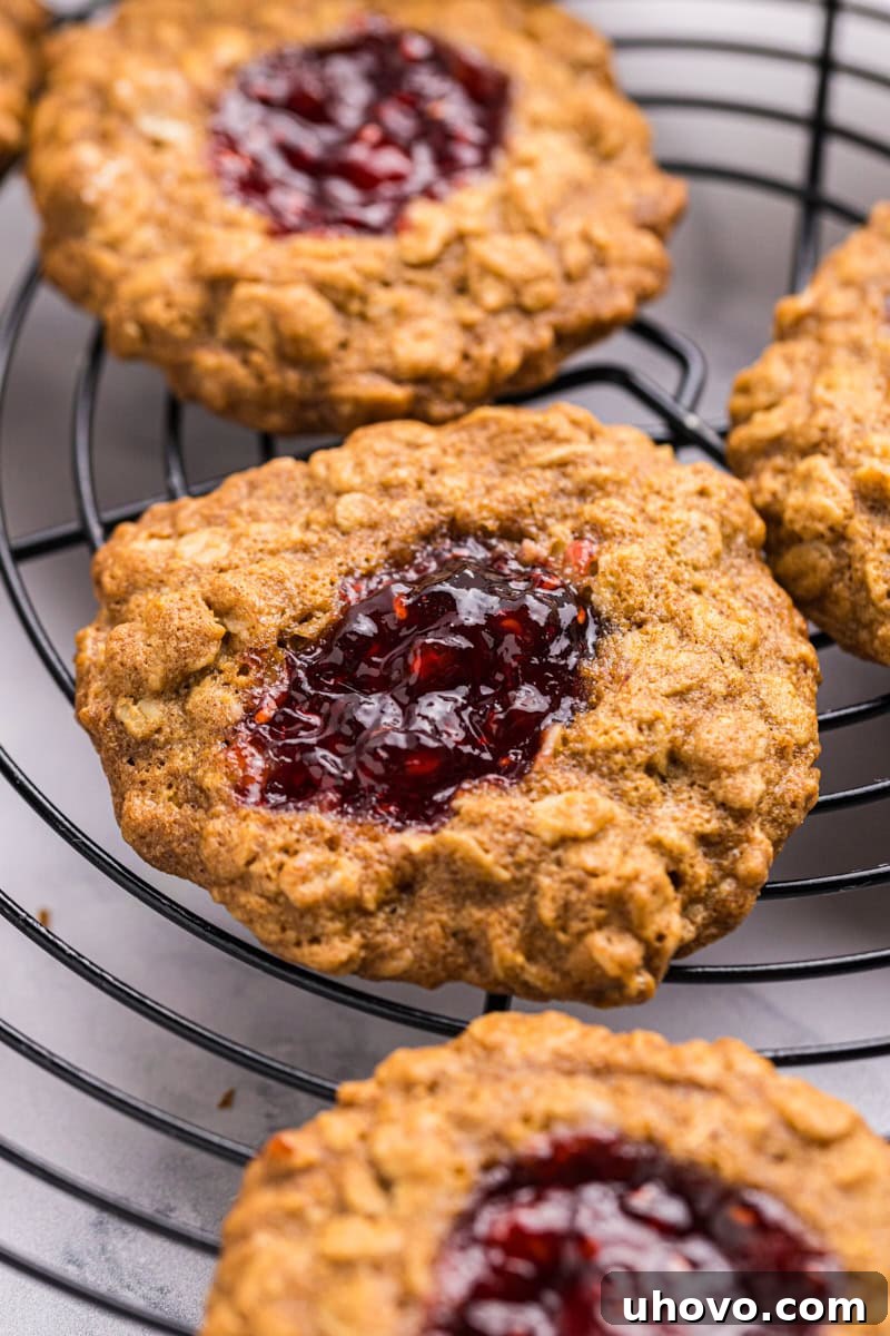 oatmeal thumbprint cookies cooling on a wire rack